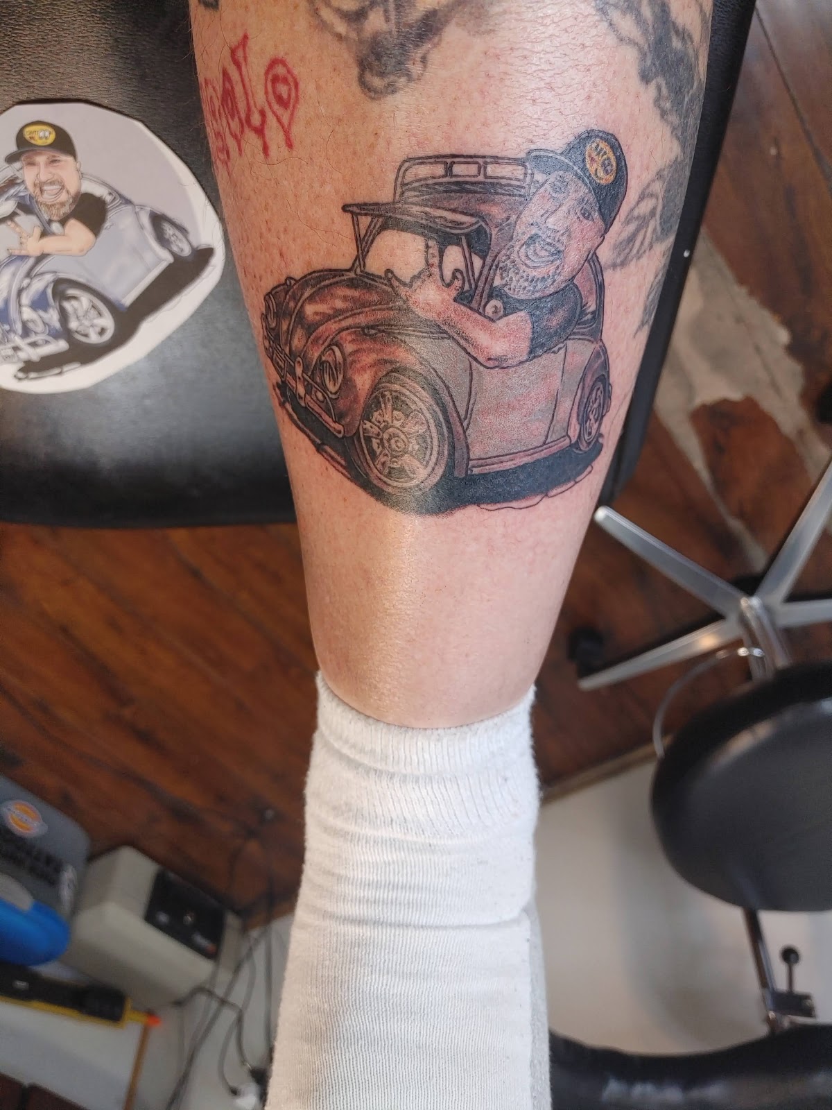 Color caricature tattoo by Coffin City Tattoo
